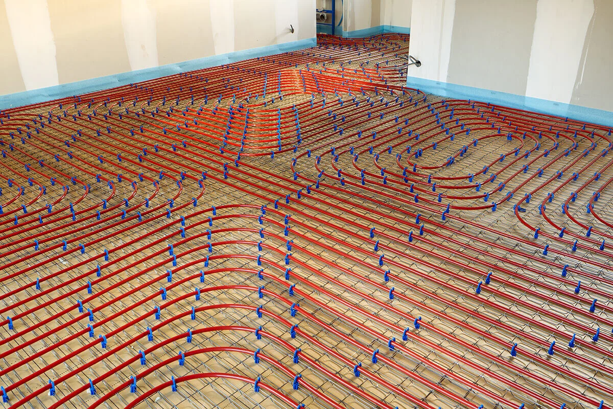 Plancher chauffant et thermopompe